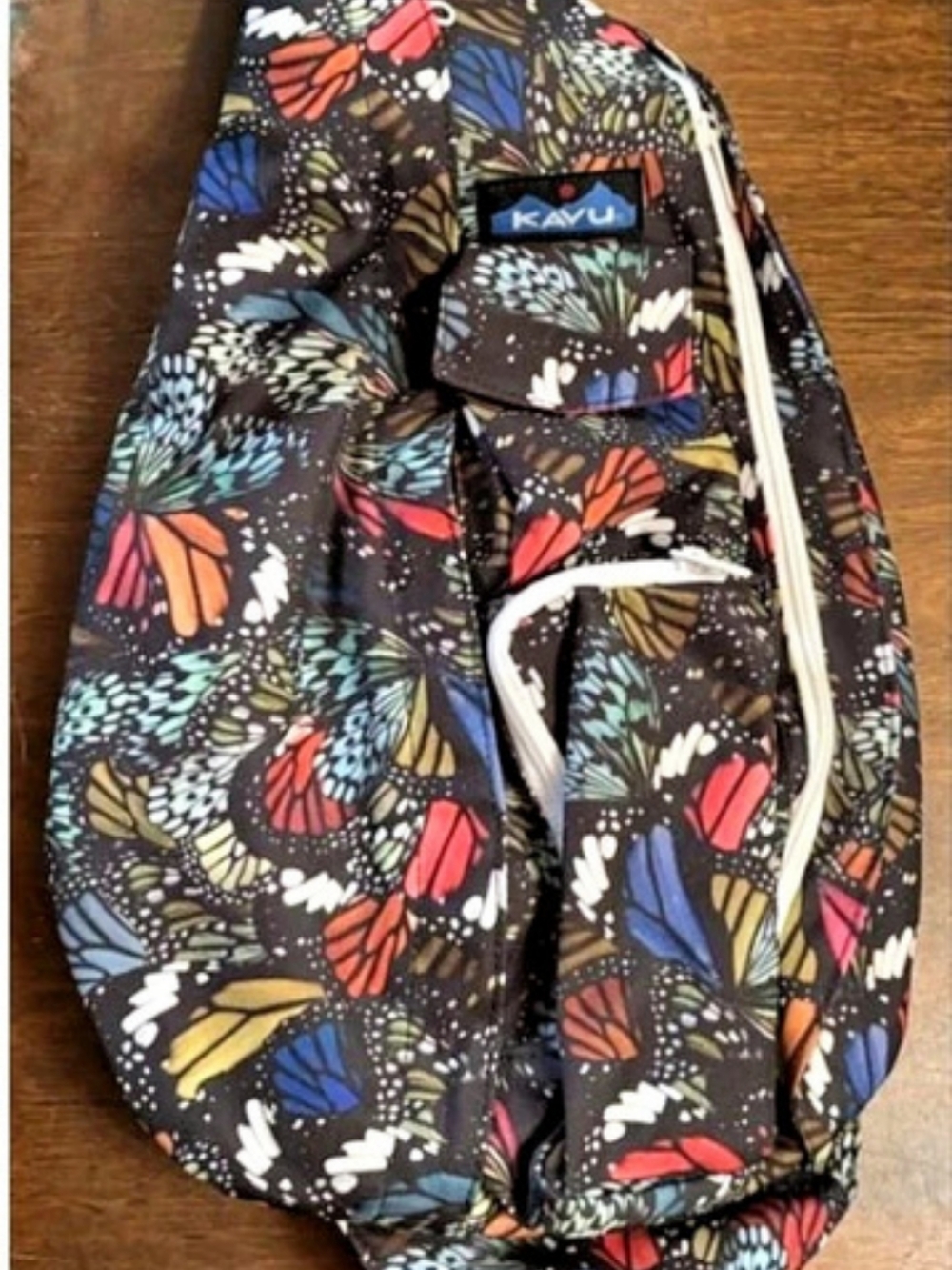 KAVU Rope Sling Butterfly Floral Sling Bag Black & Multicolor